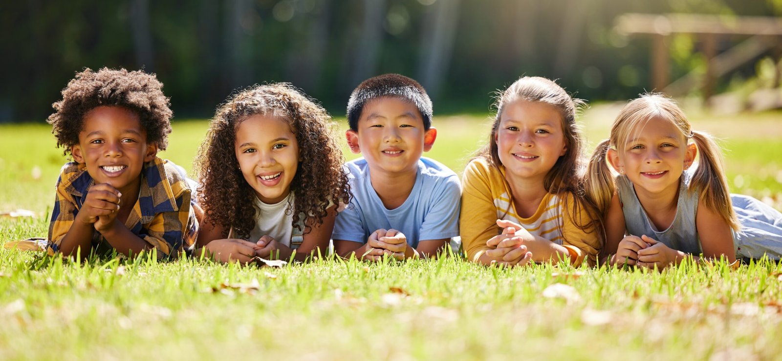 Portrait,,Diversity,And,Children,On,Grass,,Friends,And,Summer,Break